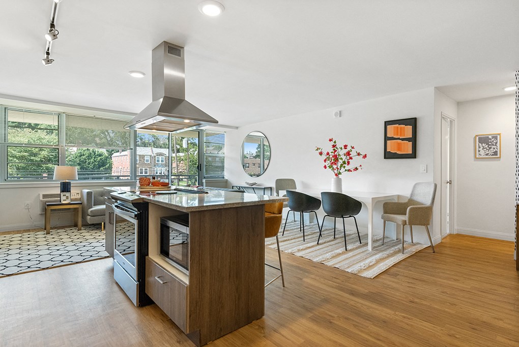 Gorgeous, open apartment layout with gourmet kitchen and large windows with lots of natural light