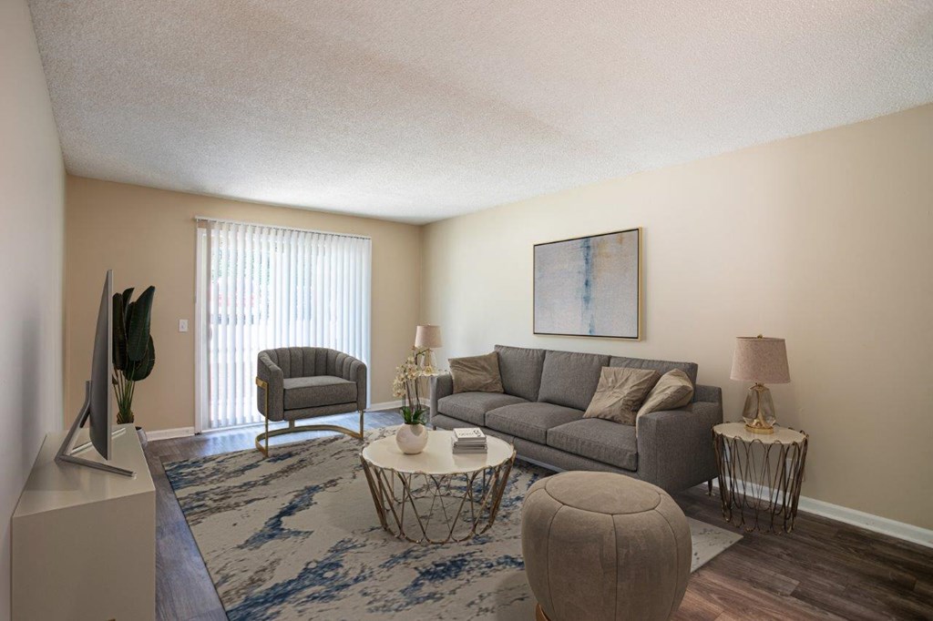 a living room with a couch and a tv