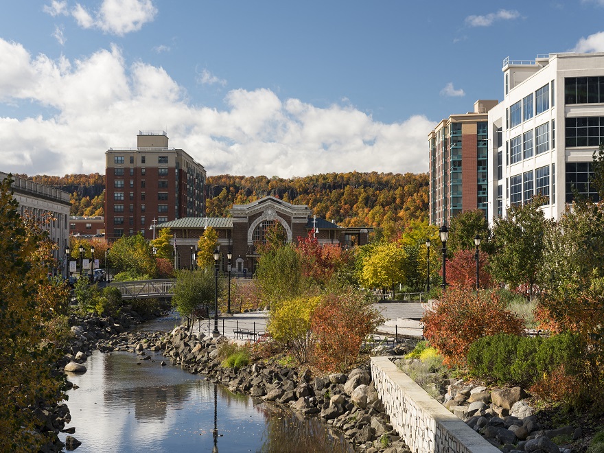 a river running through a city with buildings