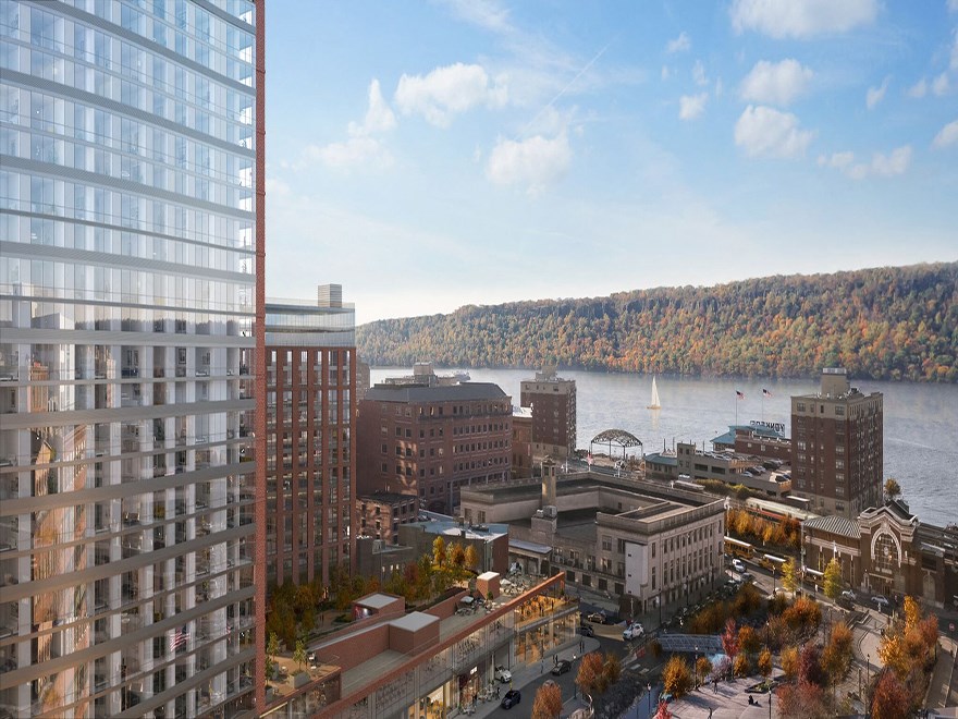 an aerial view of the city of falls church with the water and mountains in the