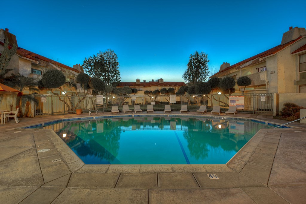 the swimming pool at the inn of the welcomes at dusk