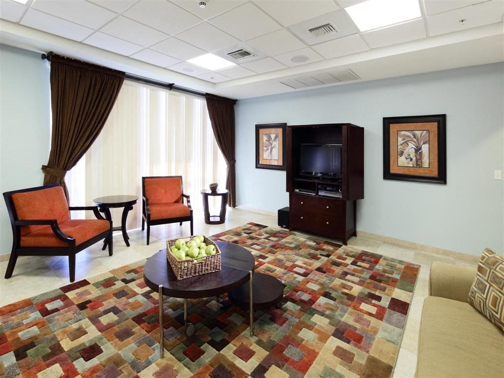 a living room with a couch and a television