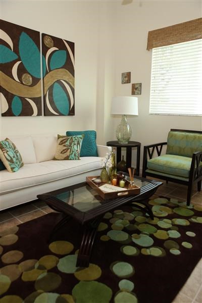 a living room with a couch and a table