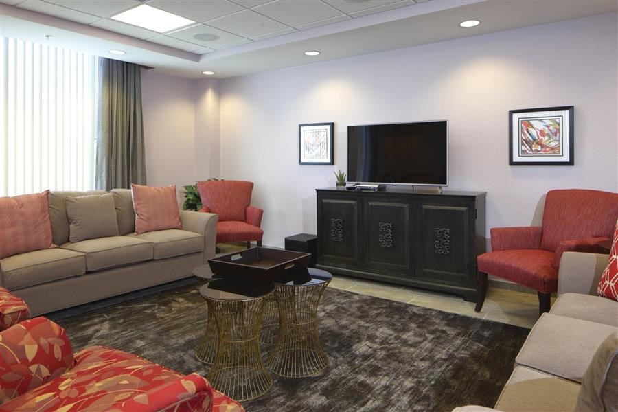 a living room with a couch and a television