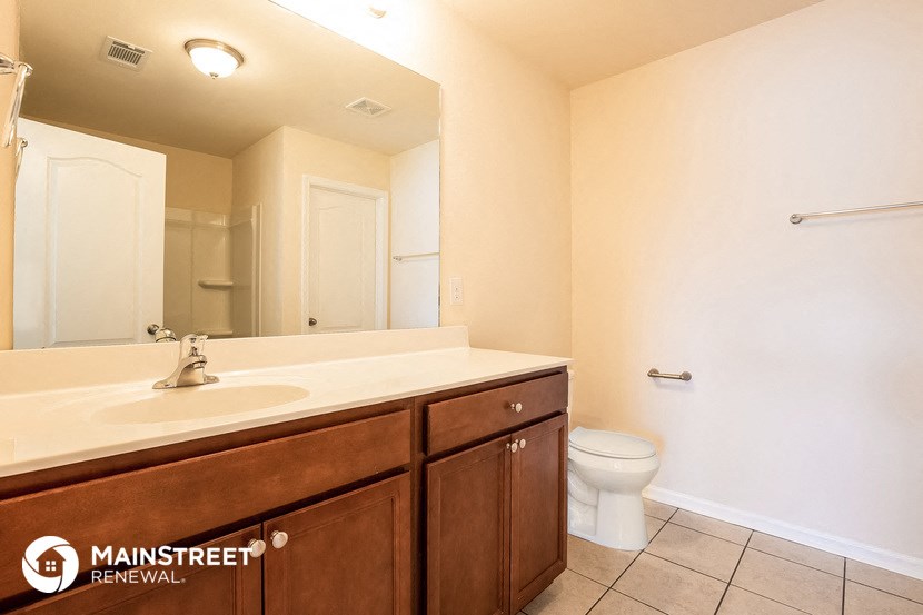 a bathroom with a sink and a toilet
