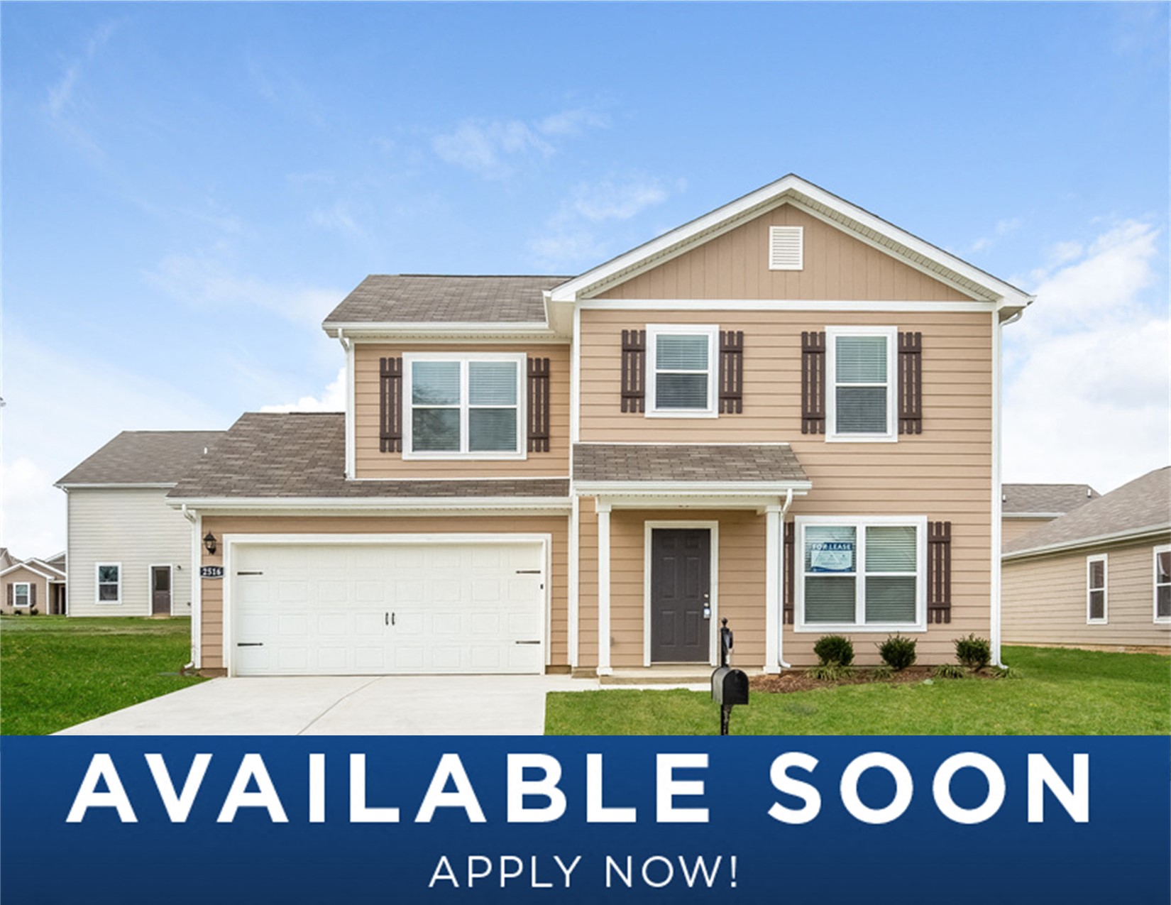 a beige house with a yard and a sign that reads available soon