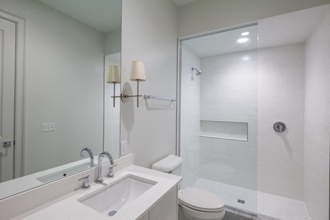 the preserve at ballantyne commons bathroom with sink toilet and shower
