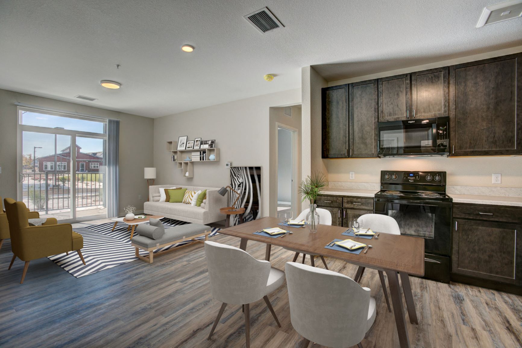 a living room with a table and chairs