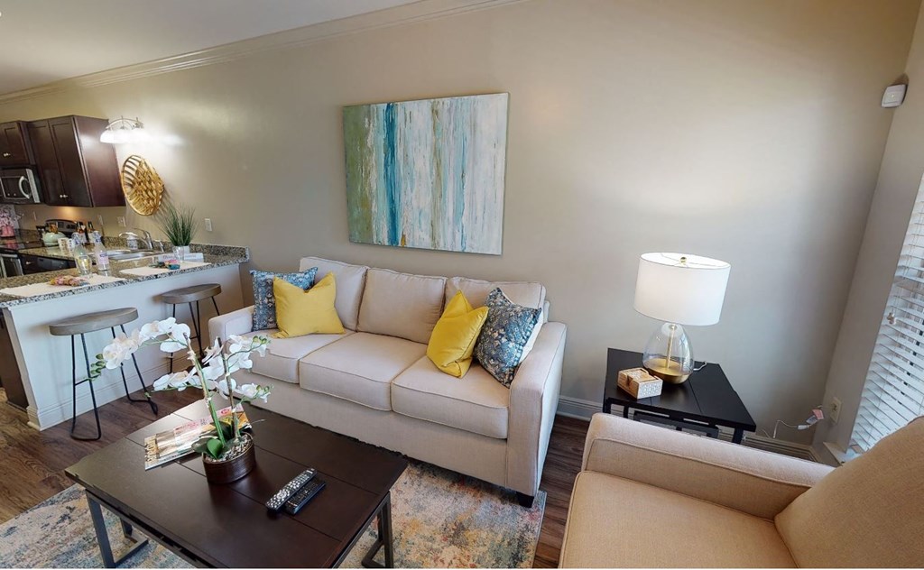 a living room with a couch and a table