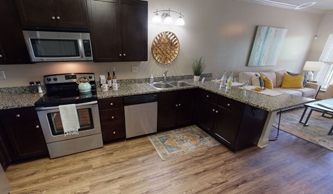 a kitchen with a sink and a counter top