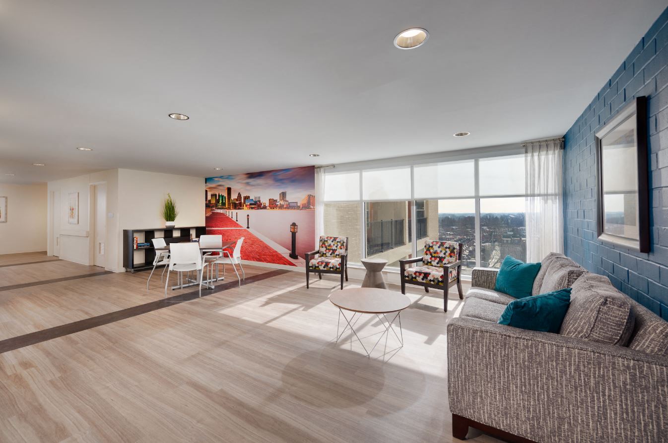 a living room with a couch and a table