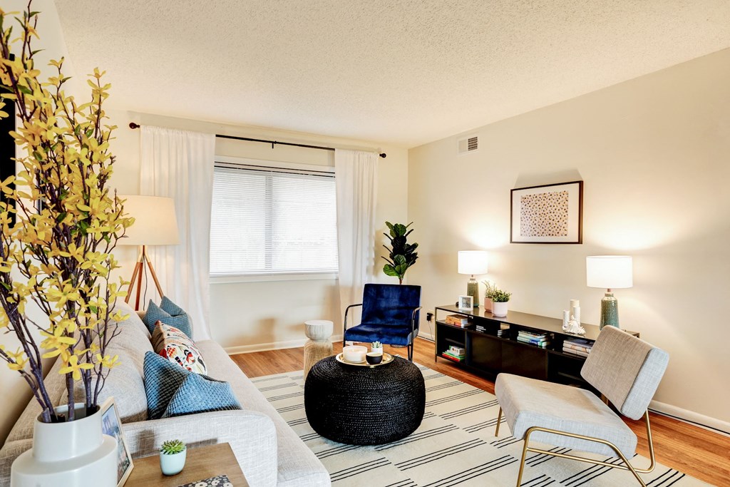 a living room with a couch and a chair