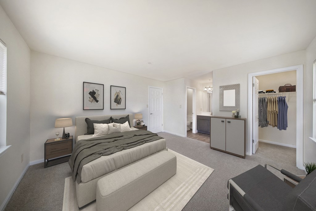 a bedroom with a large bed and a closet