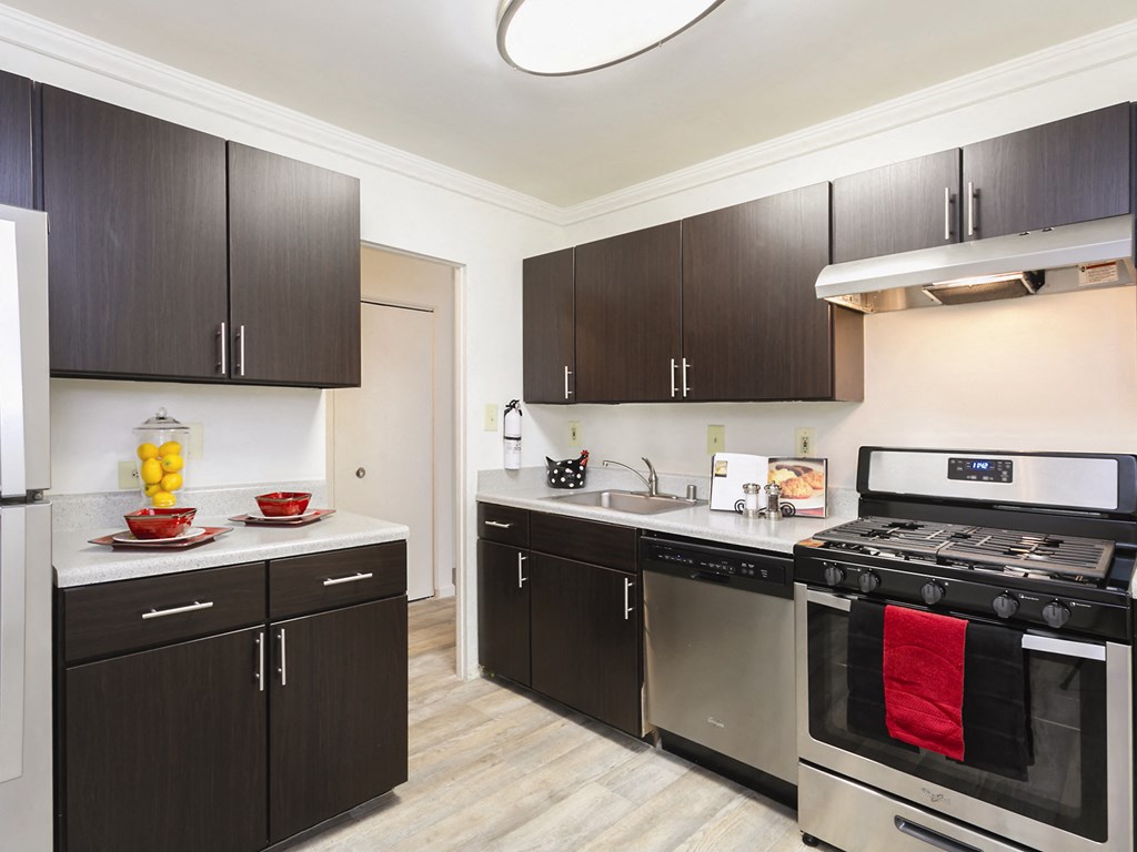 Kitchen With White Cabinetry And Black Appliances at Annapolis Roads, Annapolis, MD, 21403