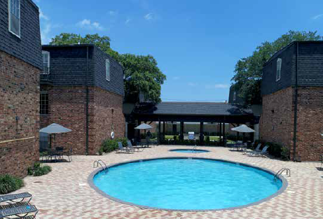 Resort style pool with paver deck and umbrellas at Magnolia Ridge Apartments, Louisiana, 70002