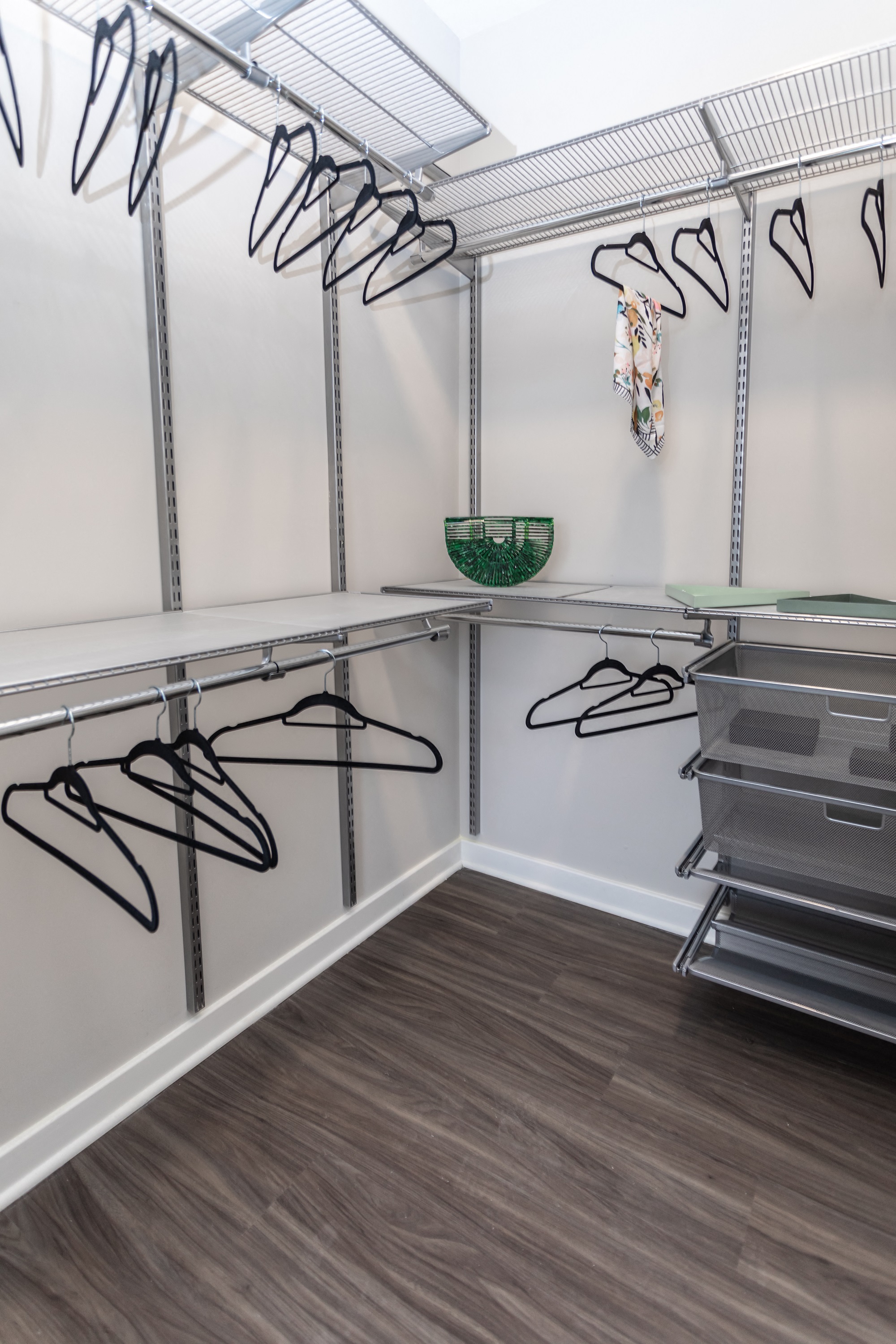 Walk-in closet with hangers and organizers in luxury Bala Cynwyd apartment