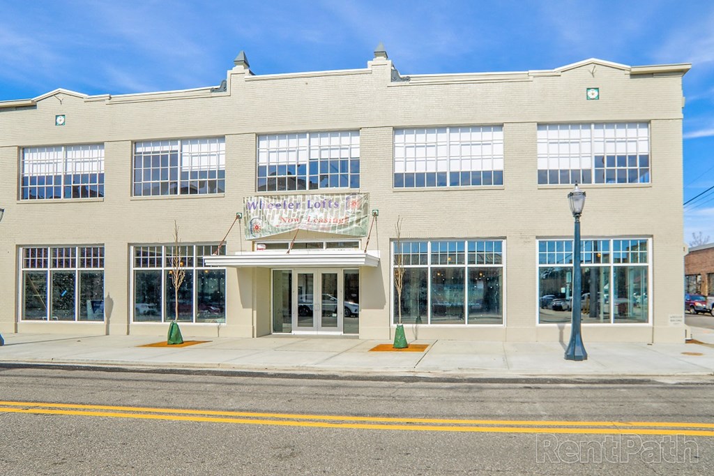 a large building with a sign on the front of it