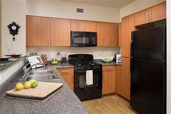 Black Kitchen Appliances at Carillon Apartment Homes, California, 91367