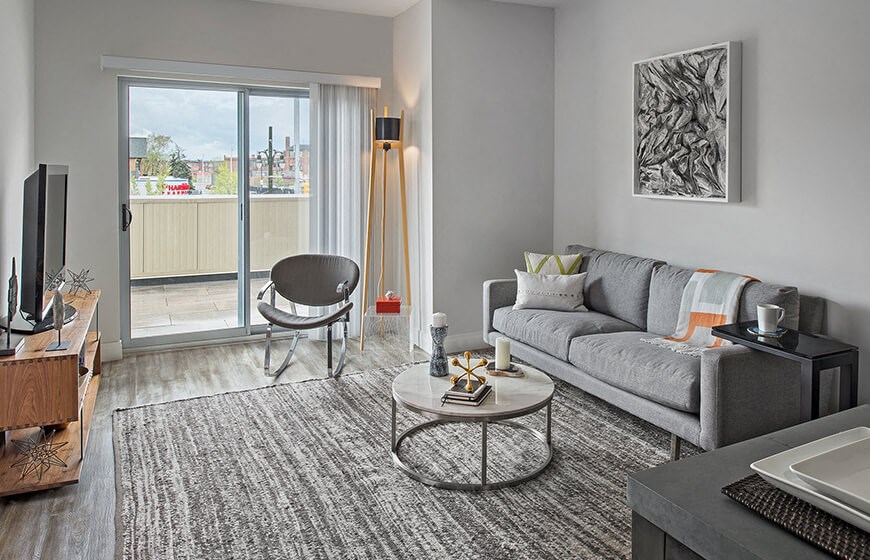 a living room with a couch and a table