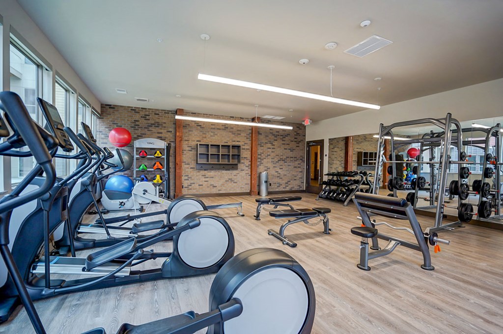 a gym with weights and other exercise equipment