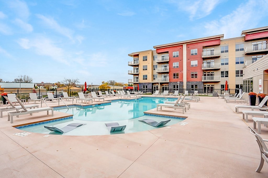 our apartments have a resort style pool with chaise lounge chairs