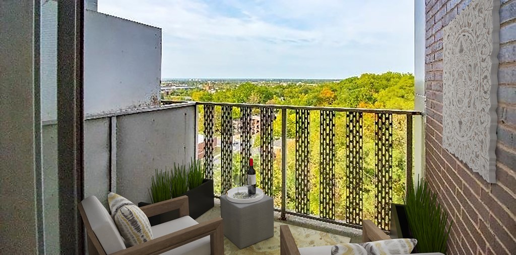 a balcony with a view of the city and trees
