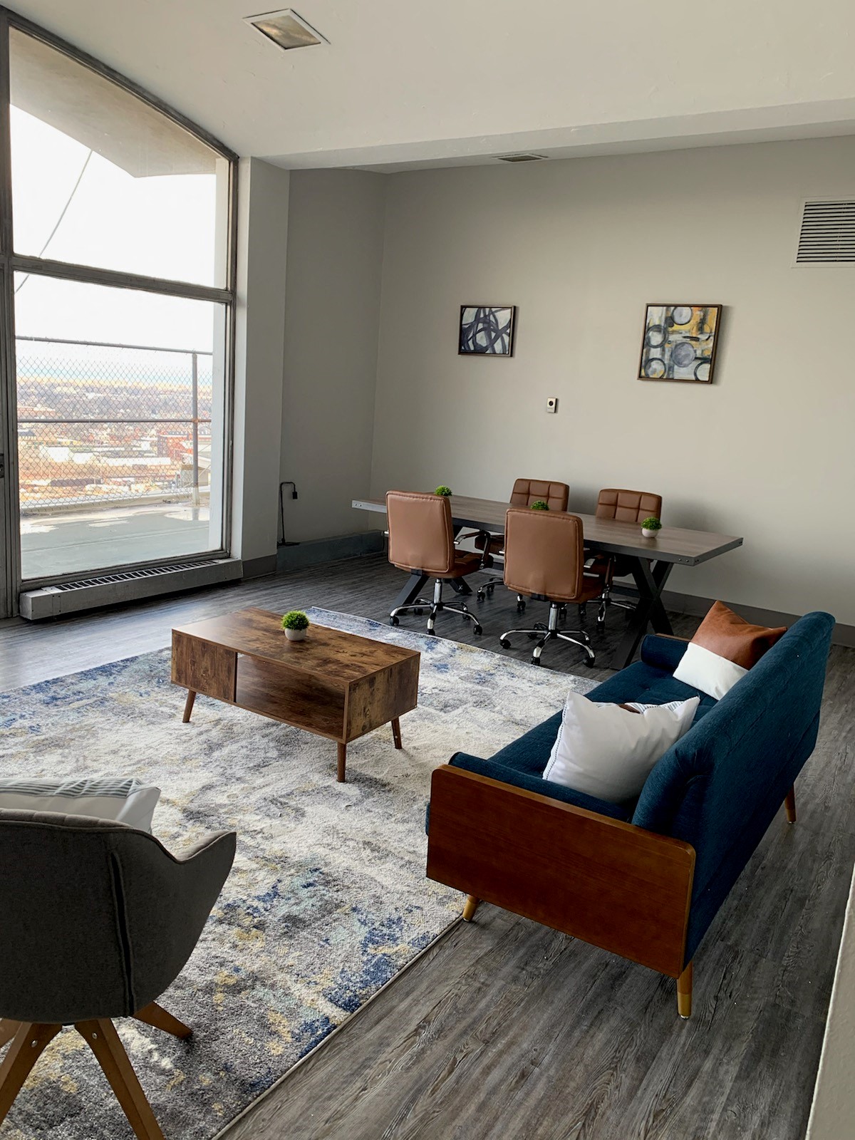 a living room with a couch and a table