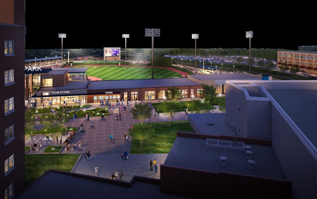 an artist s rendering at night of the proposed stadium