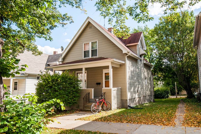 a house with a bike parked outside of it