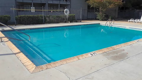 the swimming pool at the apartments for rent