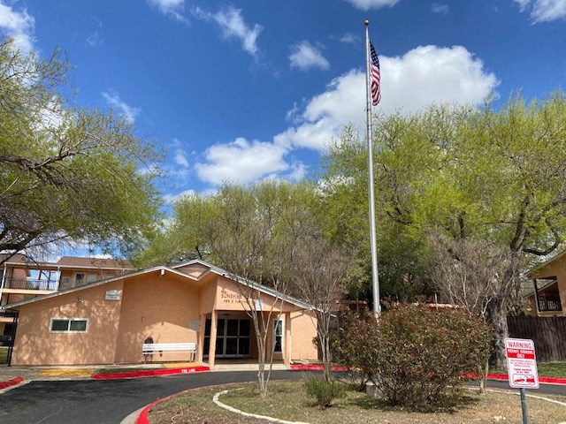a building with an flag in front of it