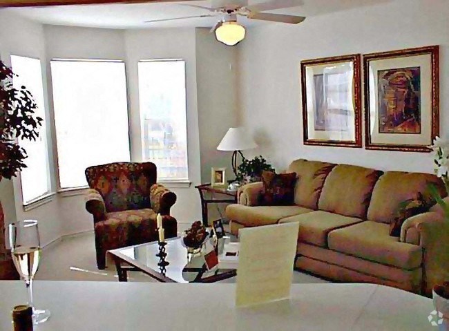 a living room with a couch and a table