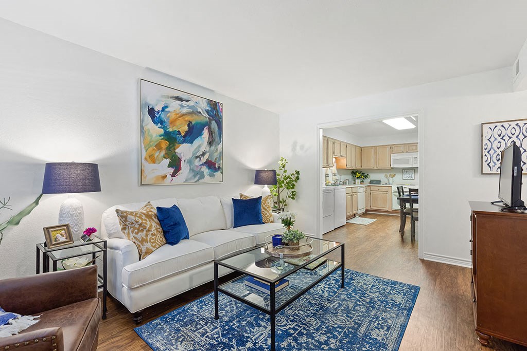 a living room with a couch and a table