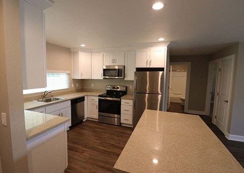 Kitchen with island l Brairwood Apartments in Livermore, CA 