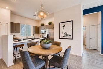 Kitchen Breakfast bar and Dining Area at Avilla Centerra at Goodyear Arizona - Photo Gallery 6