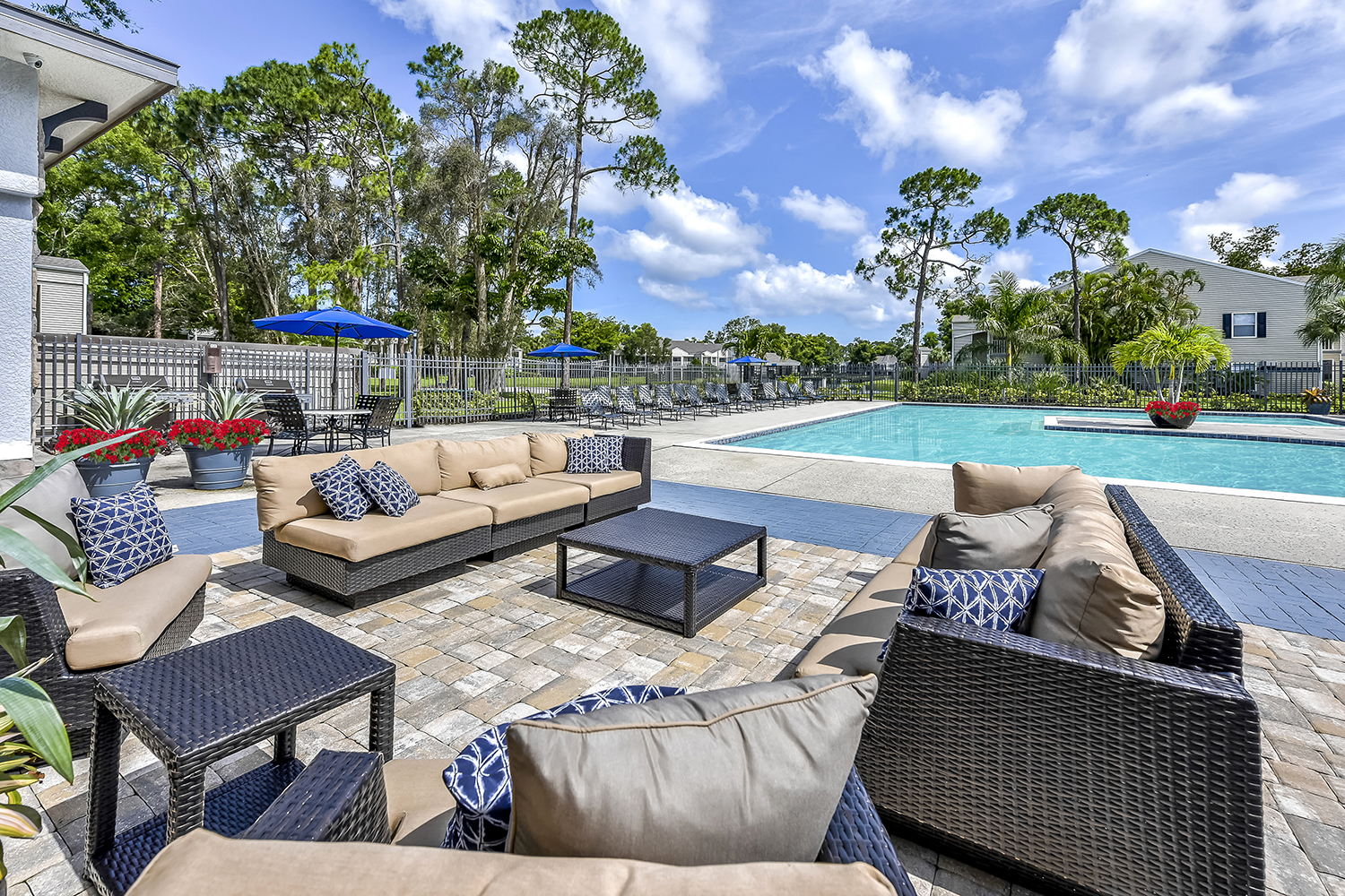 Swimming Pool and Outdoor Lounge at Brantley Pines Apartments in Ft. Myers, FL