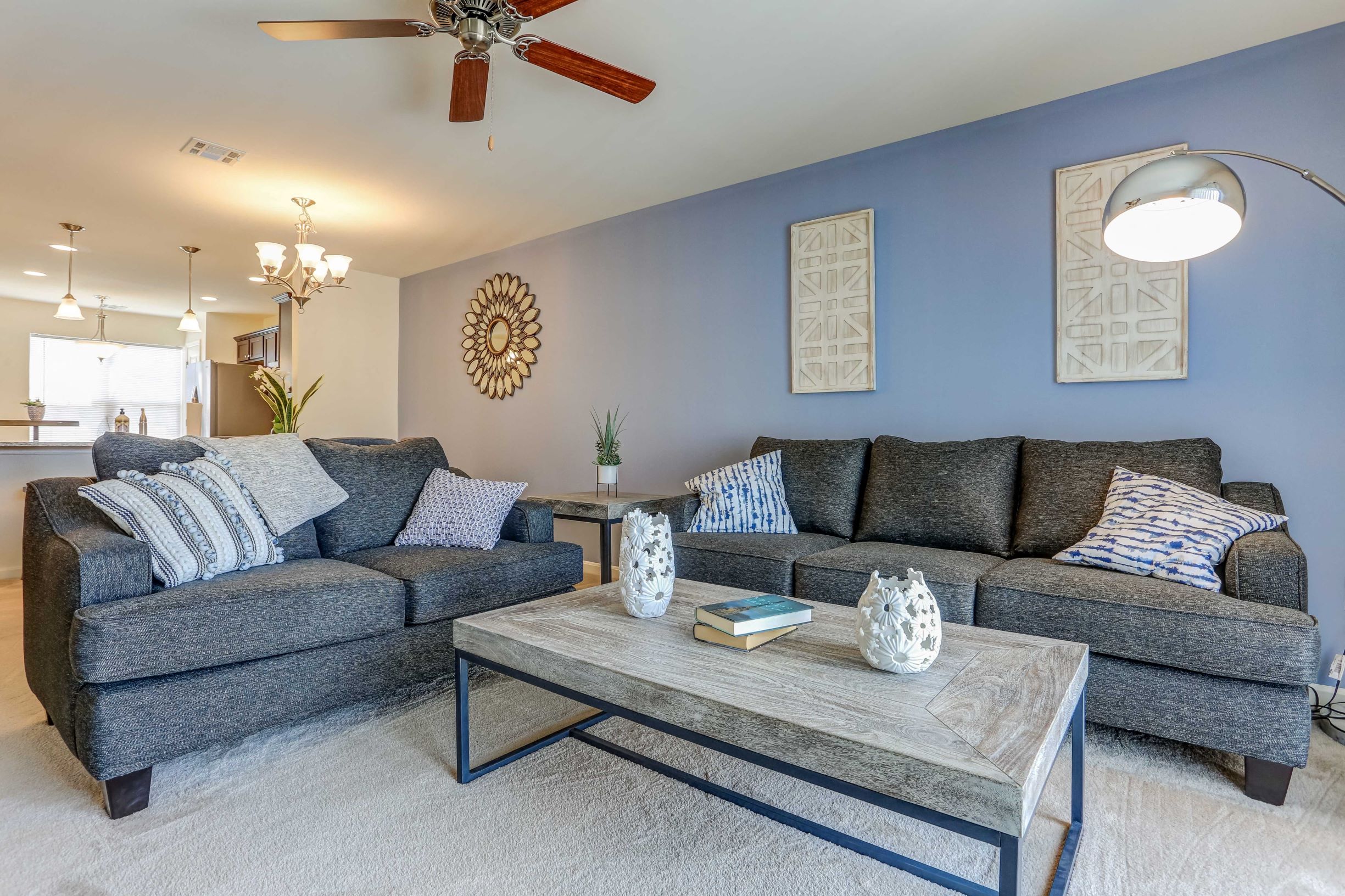 a living room with couches and a coffee table