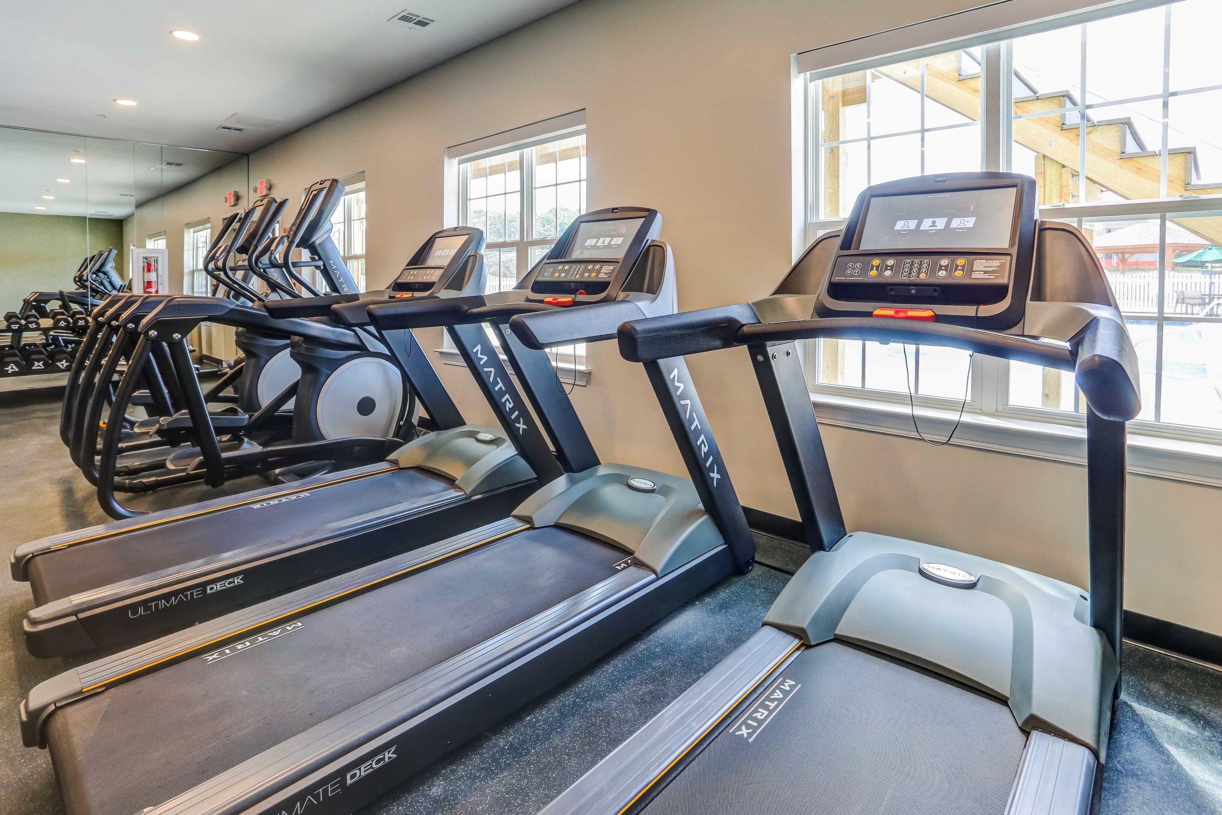 the gym at the at the boulevard apartments in