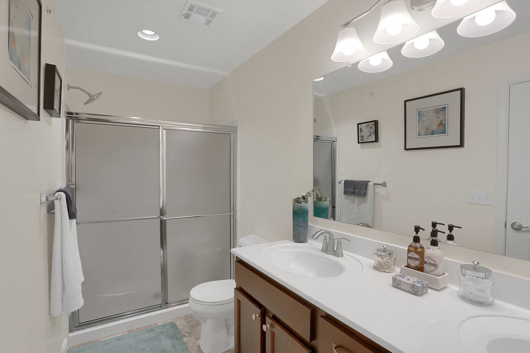 a bathroom with a sink and a shower