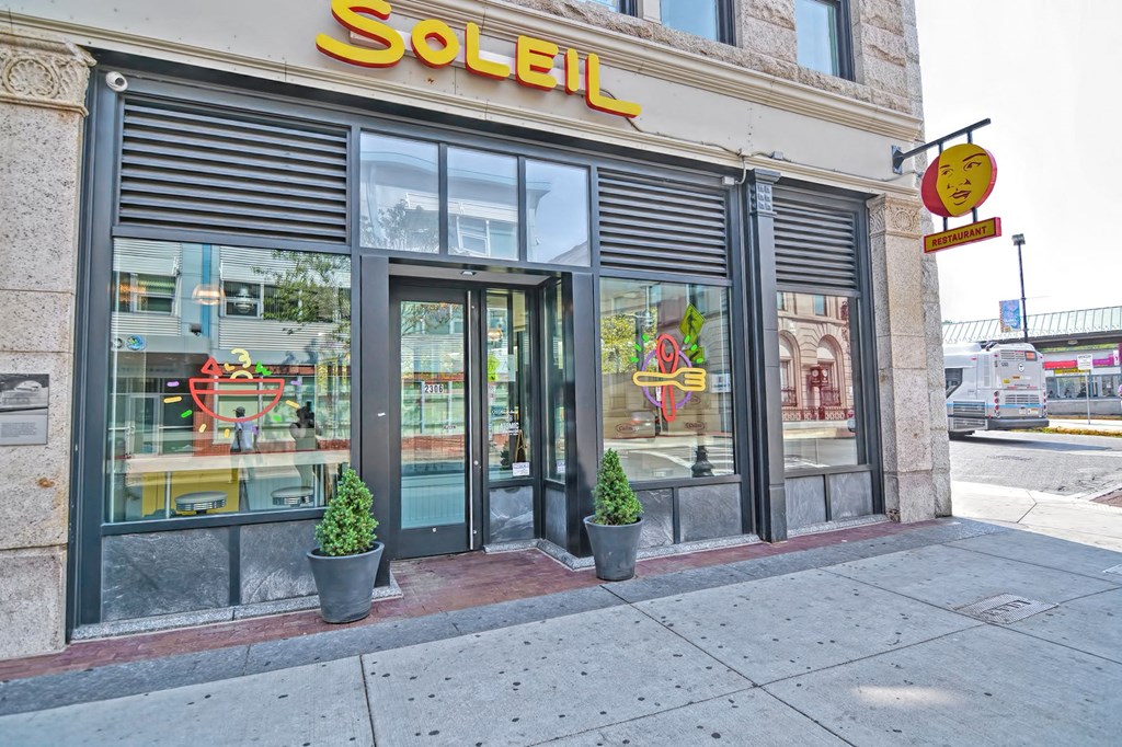 the facade of the soli store on the corner of a street