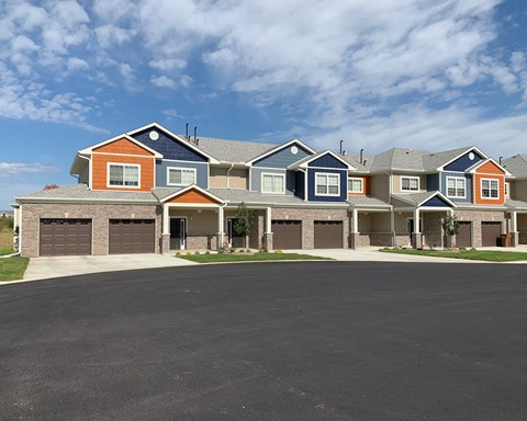 a large house with a street in front of it