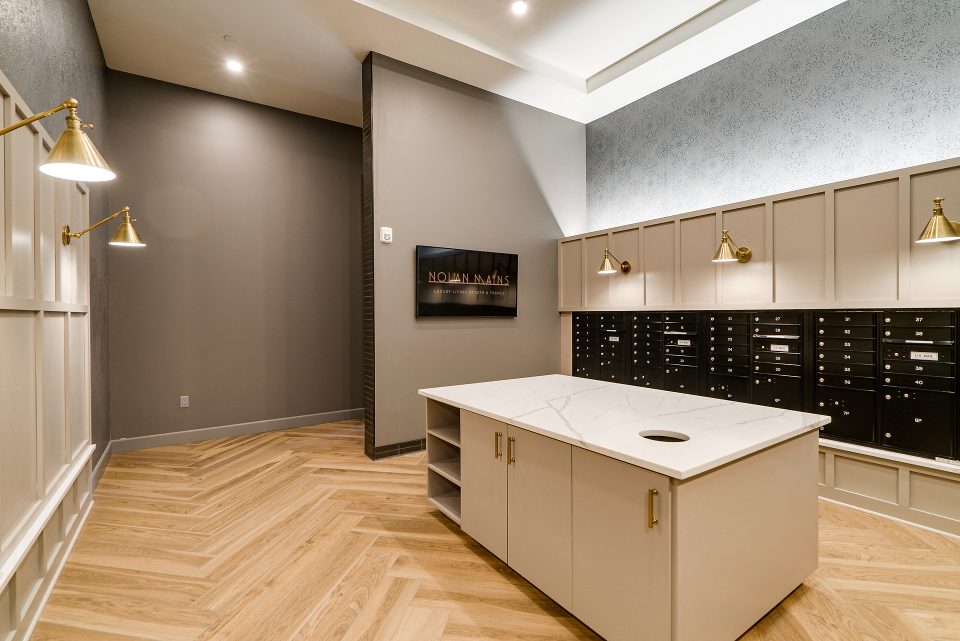 a kitchen with a white counter top and some cabinets