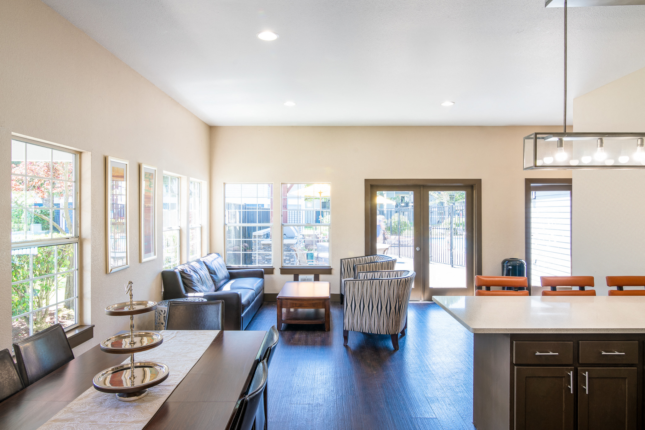 the view of the living room and dining room from the kitchen