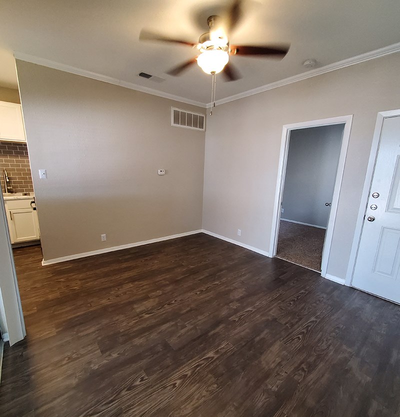 Living room with view to kitchen at GEORGETOWN PARK, Texas
