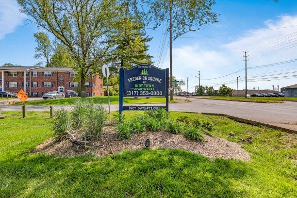 a sign on the side of a street