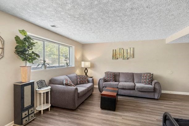 a living room with a couch and a table