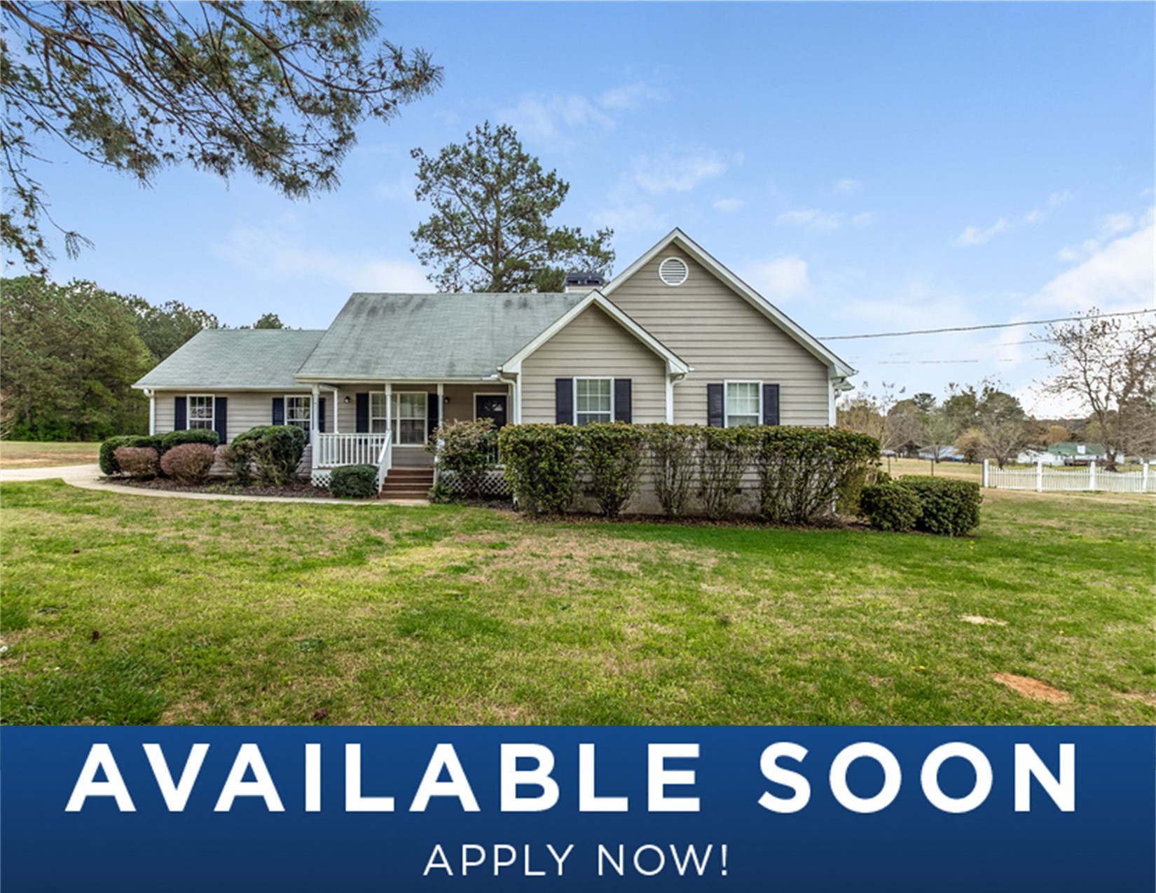 a house with a green lawn and a green yard and the words available soon