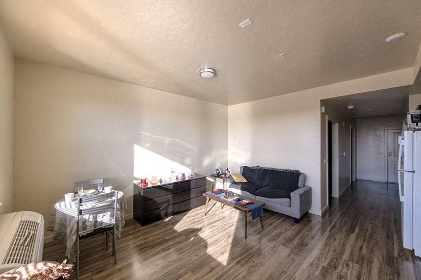 a living room with a couch and a table