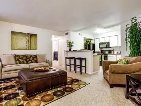 a living room with a couch and a table