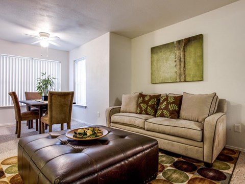 a living room with a couch and a table